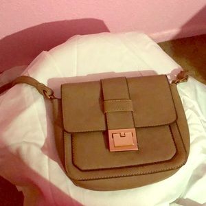 Small brown cross over purse